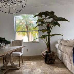 Largealer artificial plant in bowl