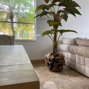 Largealer artificial plant in bowl