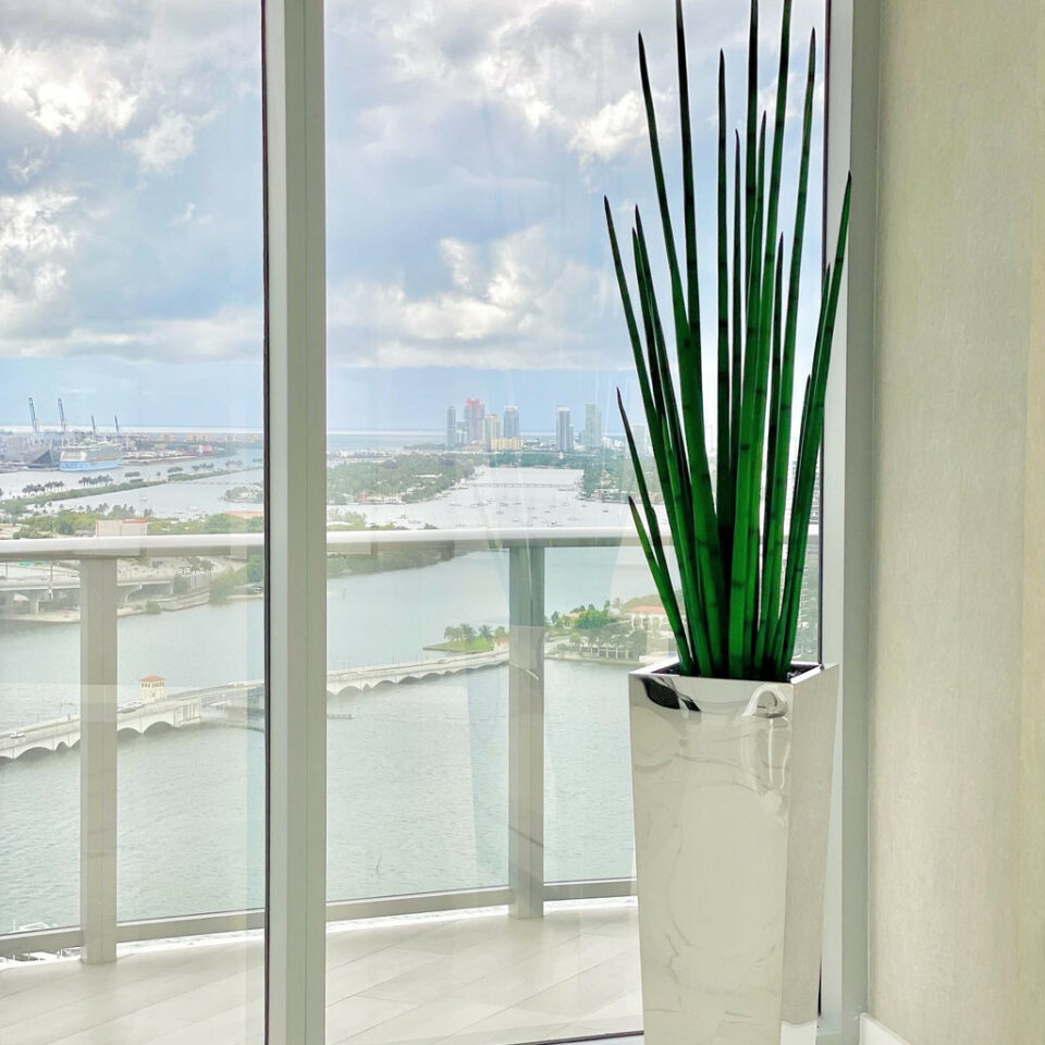 Stainedat artificial plant in vase