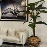 Largealer artificial plant in bowl